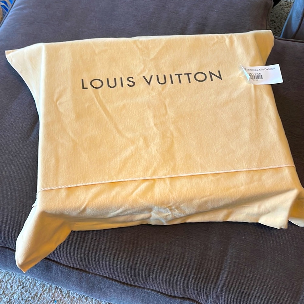 Authentic Louis Vuitton Duster Bag